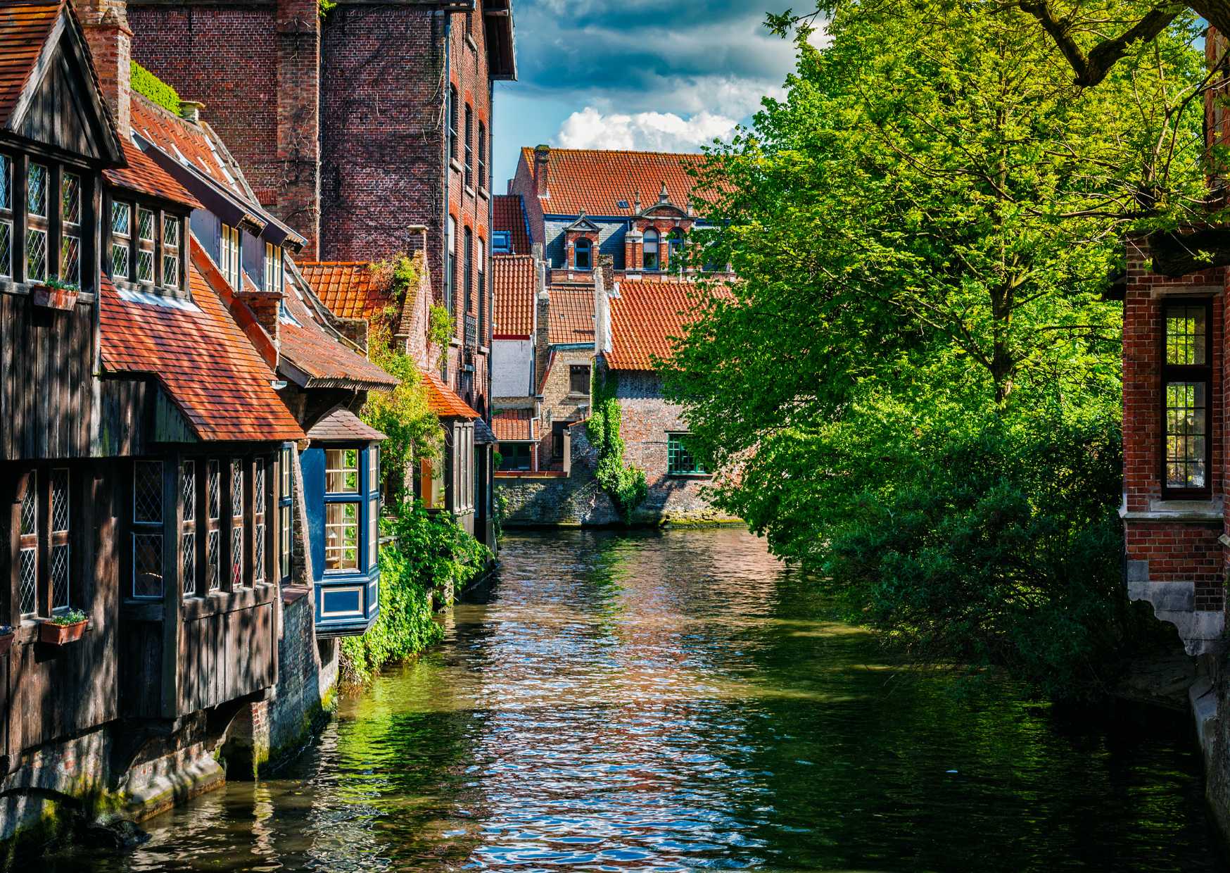 Bruges canal with medieval houses